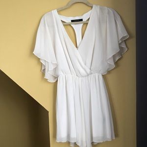 White romper with jeweled back